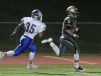 Clarkstown South's Kyle Samuels runs for a touchdown as Mahopac's Anthony Ocello pursues during their Class AA playoff game at Clarkstown South Oct. 14, 2016.