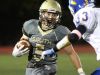 Clarkstown South's Ryan Thomas carries the ball during a Class AA playoff game at with Mahopac at Clarkstown South Oct. 14, 2016.