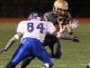Clarkstown South's Ryan Thomas is tackled by Mahopac's Brendan Diorio during their Class AA playoff game at Clarkstown South Oct. 14, 2016.