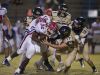 Pace running back, Anthony Johnson, Jr. (No. 32) gets gang tackled by the Gulf Breeze defense during Friday night's District-26a game.