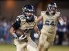 Gulf Breeze High School wide receiver, Cole Sheppard, (No. 12) runs up field for a big gain against the Pace High School defense Friday night's District 2-6A game.