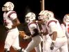 Oakland's Zarius Gamble (11) is congratulated by his teammates after making a catch and running in the first touchdown of the game against Riverdale on Friday, Oct. 14, 2016, at Riverdale.