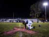 Richmond defensive tackle Stephen Ingman III kneels and cries as he reflects on the life of his grandmother, Nancy Ingman, after celebrating with his teammates for claiming the Blue Water Area Conference title over Algonac. Nancy Ingman, who died in 2015 at the age of 63 from ovarian cancer, always attended his football games and cheered him on from the stands, Stephen said. "Every game, during the National Anthem, I say a prayer for her... she is in my thoughts every game," he said.