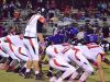 Palm Bay quarterback Stuart Brown points out offensive commands Friday night as Palm Bay visited Space Coast.