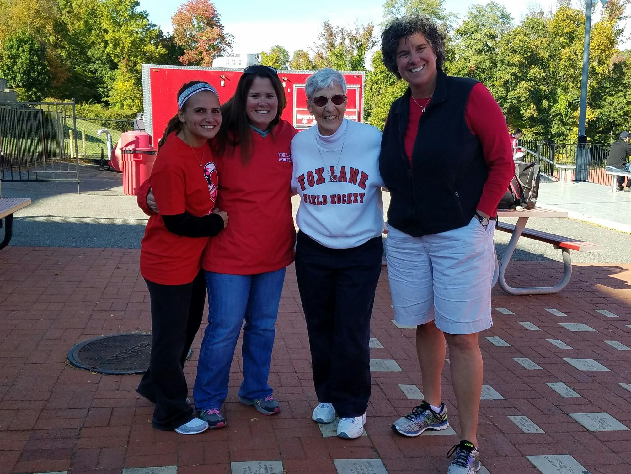 Current Fox Lane coach Kim Gigante and former coaches Heather Miller, Joanne St. George and Beth Staropoli, Fox Lane's current athletic director.