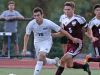 Jack Beer of Byram Hills keeps the ball away from Harrison's Ryan Homem during their game on Monday. Boys soccer beat writer Vin Mercogliano has Beer and the Bobcats winning a section title in Class A.