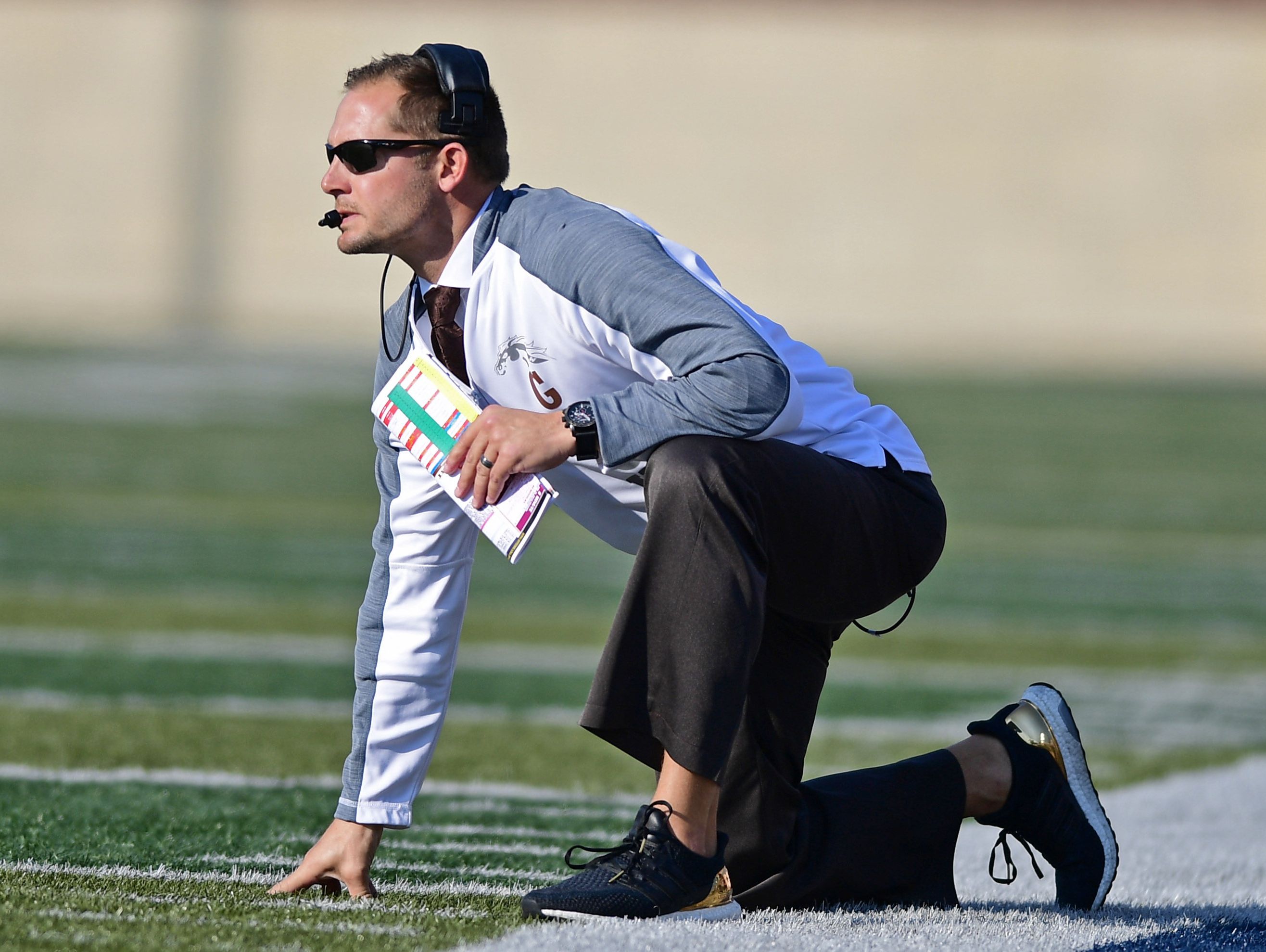 Western Michigan head coach P.J. Fleck watches from the sideline in the first quarter of an NCAA college football game against Akron on Saturday, Oct. 15, 2016, in Akron, Ohio. Western Michigan won 41-0.