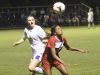 Alex Green hits a header Tuesday night against Lipscomb.