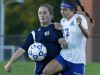 Wayne's Hannah Burns and Brockport's Leah Daly battle for a loose ball in the first half at Brockport High School.