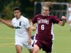 Pleasantville's Anthony Cardona, left, and Albertus Magnus' Joe Michalak battle for control of the ball during their Class B first-round playoff game at Pleasantville High School Thursday. The Panthers defeated the Falcons 5-1.