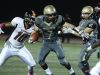 Clarkstown South's Sam Mistretta gets past Spring Valley's Devan Lawson during their Class AAquarterfinal at Clarkstown South Friday night.