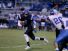 Charlestown's Antonyo Gaddie runs the ball against North Harrison Friday night.