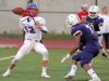 Carmel quarterback Kyle Shilling uncorks a pass during a Class AA quarterfinal at New Rochelle High School Friday night. New Rochelle defeated Carmel 6-0.