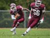 Concord's Lennox Nembhard, No. 5, changes direction as Earl Jester, No. 56, blocks downfield.