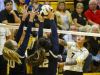 Bishop Verot's Teya Leonard hits through Holy Name defenders Megan Przedpelski and Rachel Rosales as Tampa Academy of Holy Names played Bishop Verot in their Region 5A-3 volleyball quarterfinal.