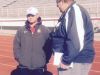 Clinton Township Chippewa Valley football coach Scott Merchant, left, oversees practice for a playoff game against Macomb Dakota.