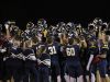 DeWitt players celebrate their 21-7 win over East Lansing Friday, Oct. 28, 2016, in DeWitt, Mich.