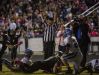 Referees single a touchdown late in the second quarter after Fairview High School's _ dives into the end zone.