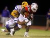 Oakland's Lontavious Wilson (27) runs the ball as Smyrna's Deven Sims (31) and Eric Recasner (41) try to bring Wilson down, on Friday, Oct. 28, 2016, at Oakland.