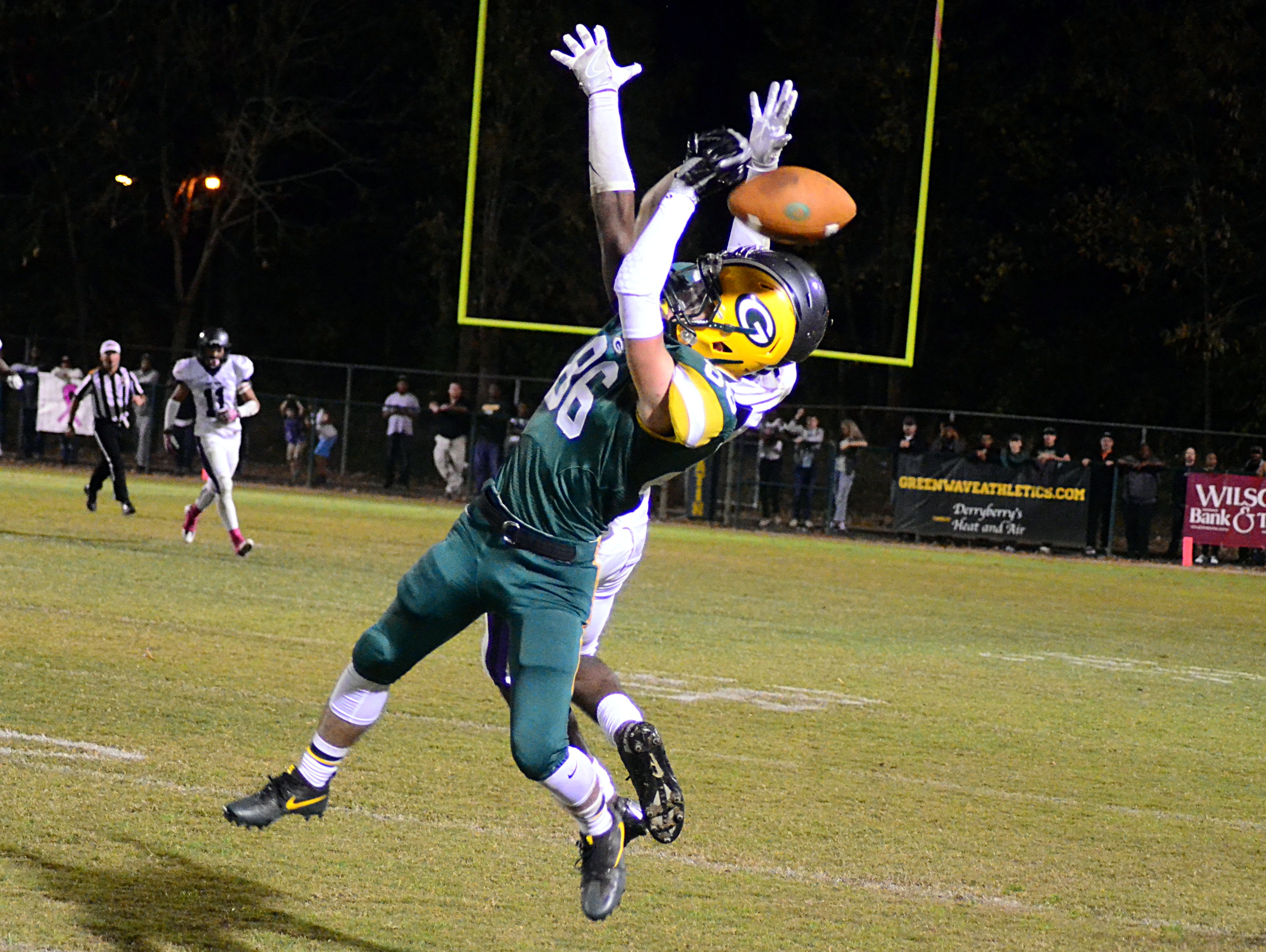 Gallatin High senior Matthew Knight has a pass knocked away from him by a Cane Ridge defender during third-quarter action.