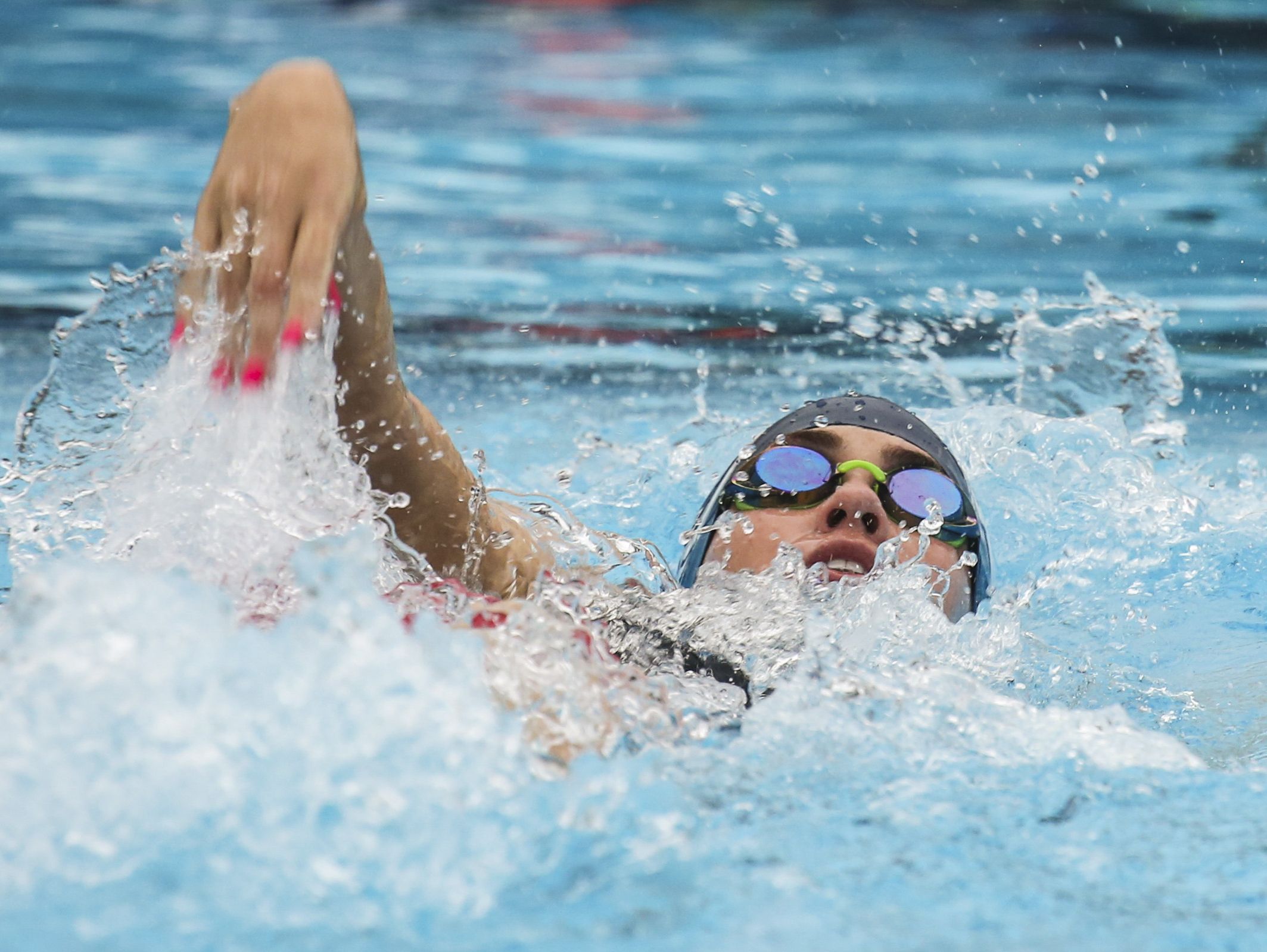 Alina Faunce of Estero performs the backstroke portion of her 200 yard IM as she went on to win the third heat during the Region 3A-3 swimming at FGCU Aquatic Center.