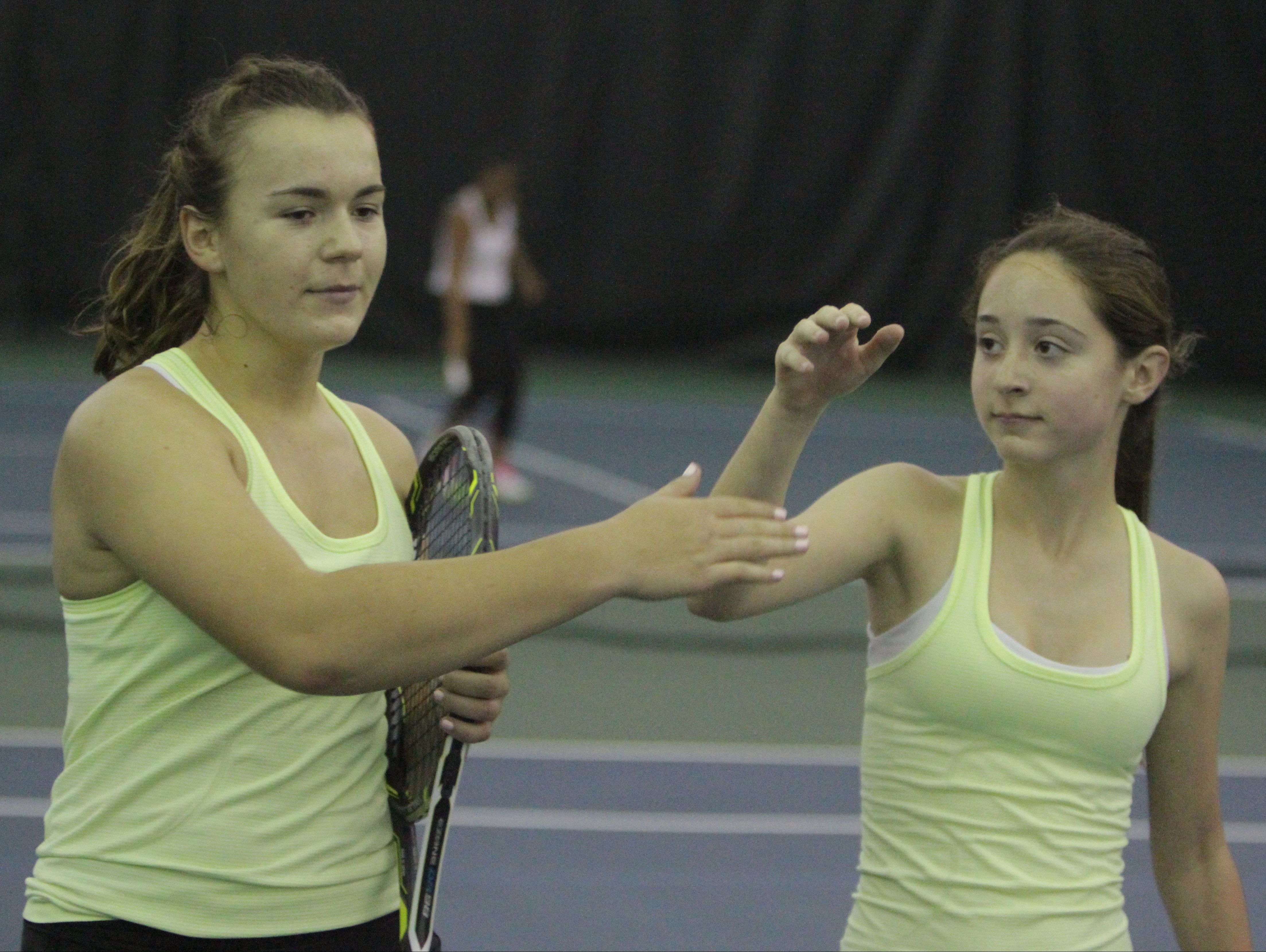 Clarkstown North's Martyna Czarnik (left) and Sydney Miller celebrate after winning a quarterfinal match at the New York State girls tennis tournament at Sound Shore Indoor Tennis in Port Chester on Sunday, Oct. 30th, 2016.