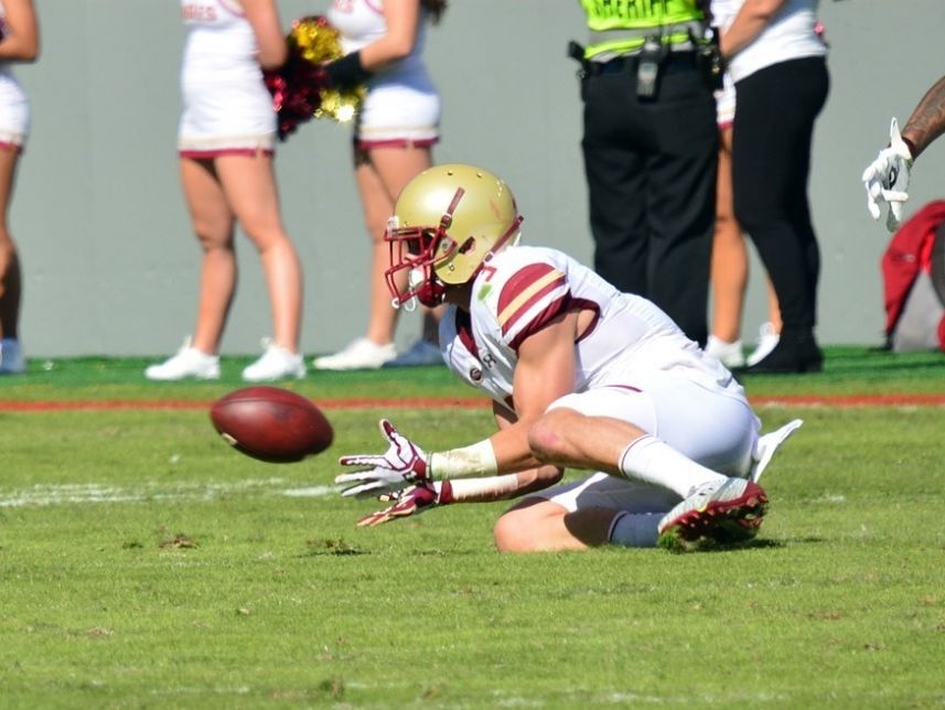 Boston College sophomore Michael Walker, a Naples graduate, attempts to catch a pass Saturday against North Carolina State. He finished with six grabs for 78 yards.