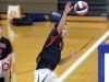 Hilton's Hunter Betrus takes a swing at the net.