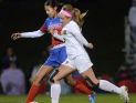 Fairport’s Hannah Shin, left, defends against Victor’s Emily Leonard.