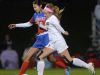 Fairport’s Hannah Shin, left, defends against Victor’s Emily Leonard.