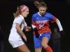 Fairport’s Claire Myers, right, tips the ball by Victor’s Rachel Ewanechko.