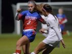 Fairport’s Morgan Brady, left, tries to block a pass by Victor’s Olivia Damico.