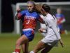 Fairport’s Morgan Brady, left, tries to block a pass by Victor’s Olivia Damico.