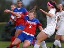 Fairport’s Zoe Janes tackles the ball away from Victor’s Jojo Leonardo.
