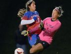 Victor goalie Hannah Hartman, right, clears the ball from Fairport’s Emily Racaniello during Victor’s 2-1 win on Monday at Victor High School.