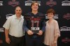Austin Troxell presents his Dream Champion award to his parents (Photo: Intersport)