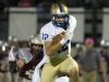 CAK's Cole Smith (12) leaps over Alcoa's Jack Warwick during the Alcoa versus CAK high school football game at Alcoa high school Thursday, Oct. 29, 2015. (News Sentinel file photo)