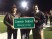 Former state Rep. Joe Armstrong, Zenobia Dobson and state Rep. Eddie Smith show the new Zaevion Dobson Memorial Bridge sign during halftime of the Fulton High School football game (Photo: Chierstin Susel, WBIR)