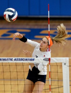 Sacred Heart Academy's Paige Hammons (7) hits a shot against Henry Clay High School in the 2016 State HIgh School Volley Ball Championship at Vally High School in Louisville, Kentucky.       November 6, 2016