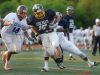 Alexander's Tyler Laird breaks a tackle during a run for a touchdown in last year's Eddie Meath All-Star Football Game.