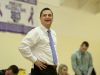 Cardinal Mooney coach Michael McAndrews smiles and looks up at the scoreboard as they widen their lead over Marine City during a basketball game Tuesday, Dec. 15, 2015 at Cardinal Mooney High School.