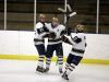 Batavia Notre Dame's Ryan Webster, center, celebrates his goal with teammates Henrik Toiviainen, left, and Ryan Antinore in a game against Rush-Henrietta.