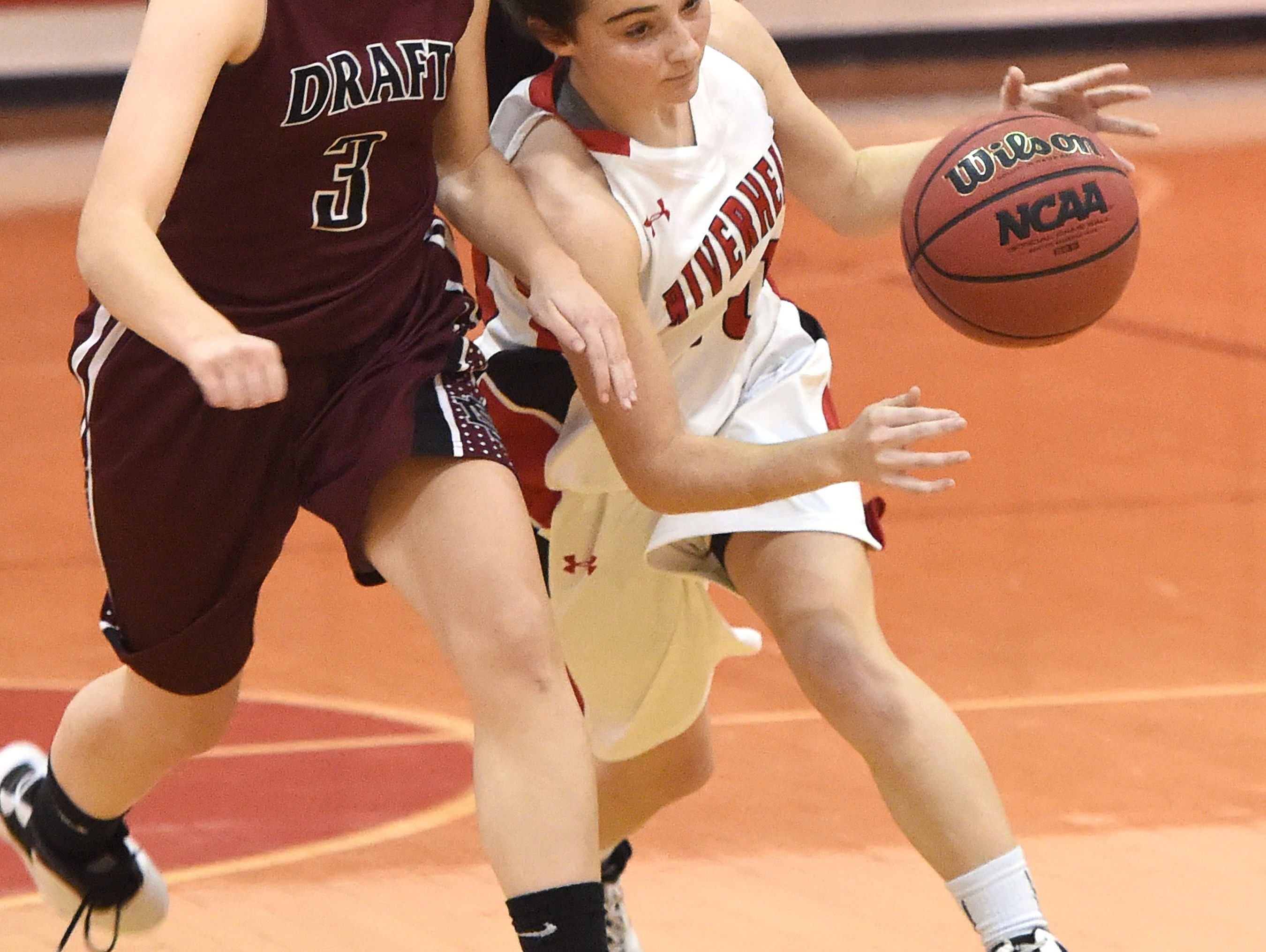 Riverheads' Christa Arehart, right, tries to get past Stuarts Draft's Rachel Sauder during a game last year. Both are back for their respective teams.