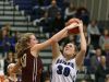 Batavia's Sam Cecere tries to shoot over Mendon's Caroline Cullinan.