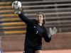 Madeline Talbot throws the ball out from the goal.