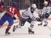 Pittsford's Connor Haims, right, is defended by Fairport's Zach Bell during the Section V Class A hockey championship at RIT's Gene Polisseni Center on Feb. 28, 2016.