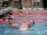 Brighton's Noah Stevens celebrates winning the finals of the 100-yard butterfly.