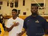 University Preparatory Charter School for Young Men basketball coach James Reaves, right.