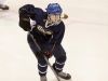 Brighton High School sophomore Rene Gangarosa carries the puck up the ice in a game.
