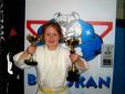 Rene Gangarosa poses with judo trophies.